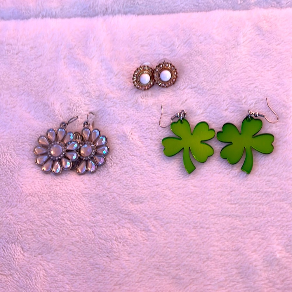 Three odd and unique earrings